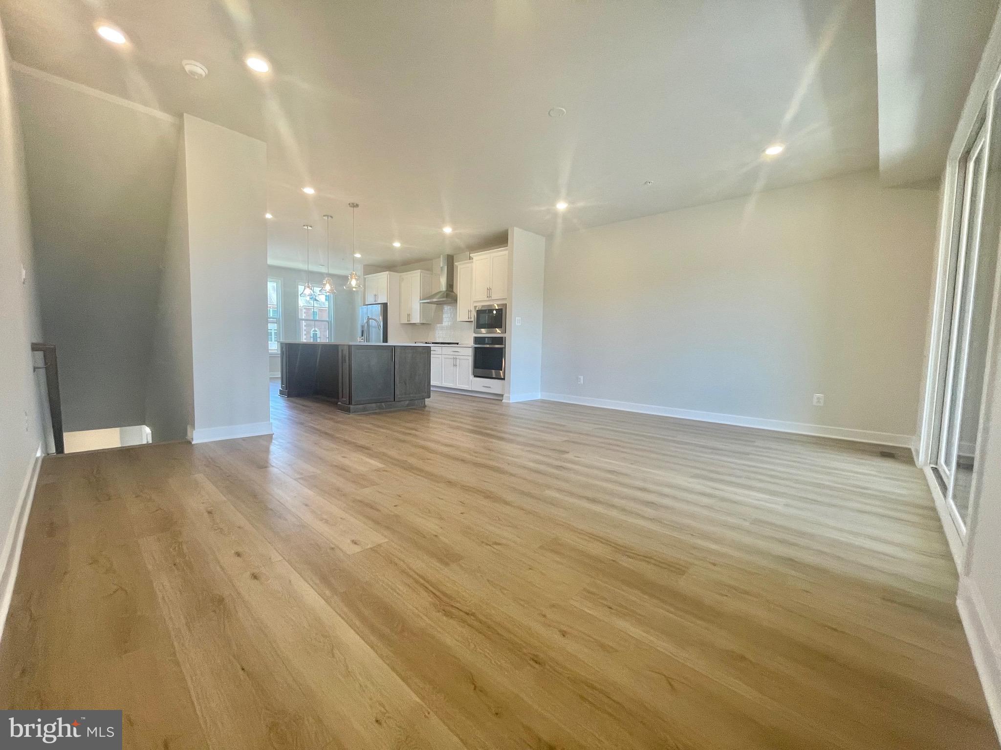 3563 Worthington Boulevard Frederick, MD 21704 - Photo 11 of 52 a view of a hallway with wooden floor