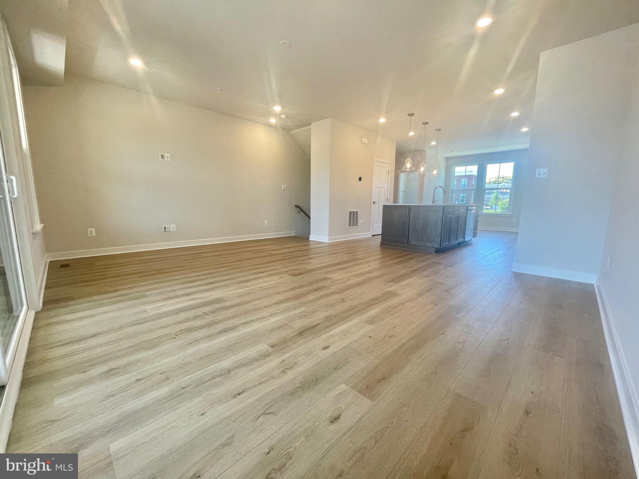 3563 Worthington Boulevard Frederick, MD 21704 - Photo 12 of 52 an empty room with wooden floor and windows