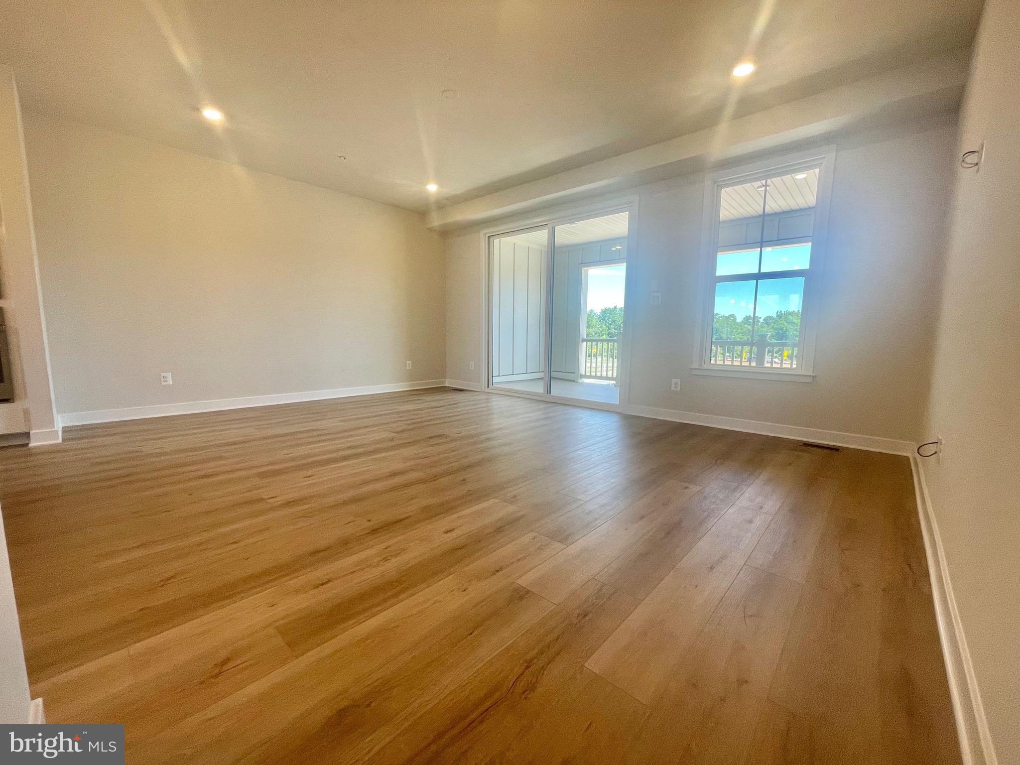 3563 Worthington Boulevard Frederick, MD 21704 - Photo 13 of 52 wooden floor in an empty room with a window