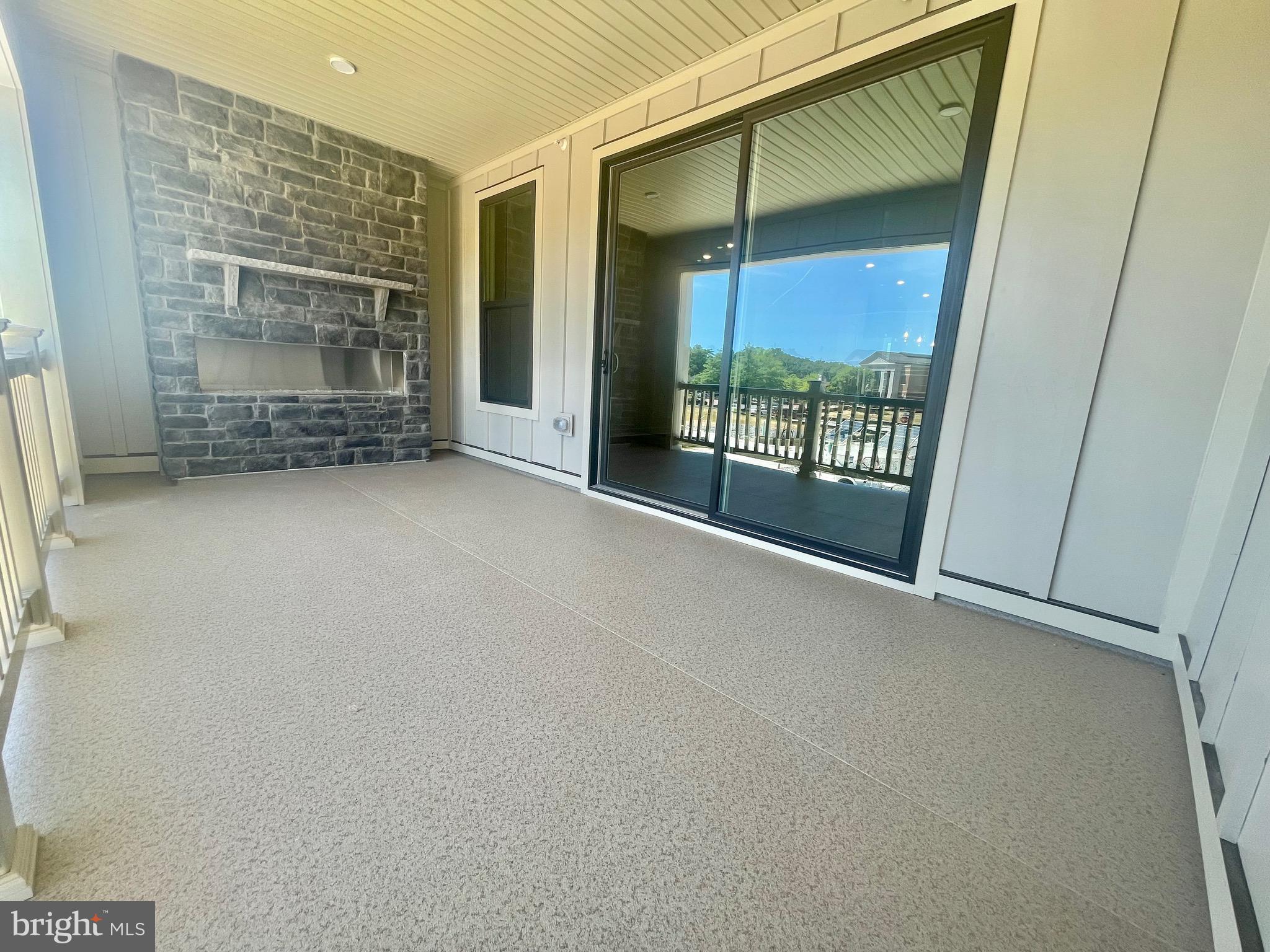 3563 Worthington Boulevard Frederick, MD 21704 - Photo 15 of 52 an empty room with sliding glass door and glass door