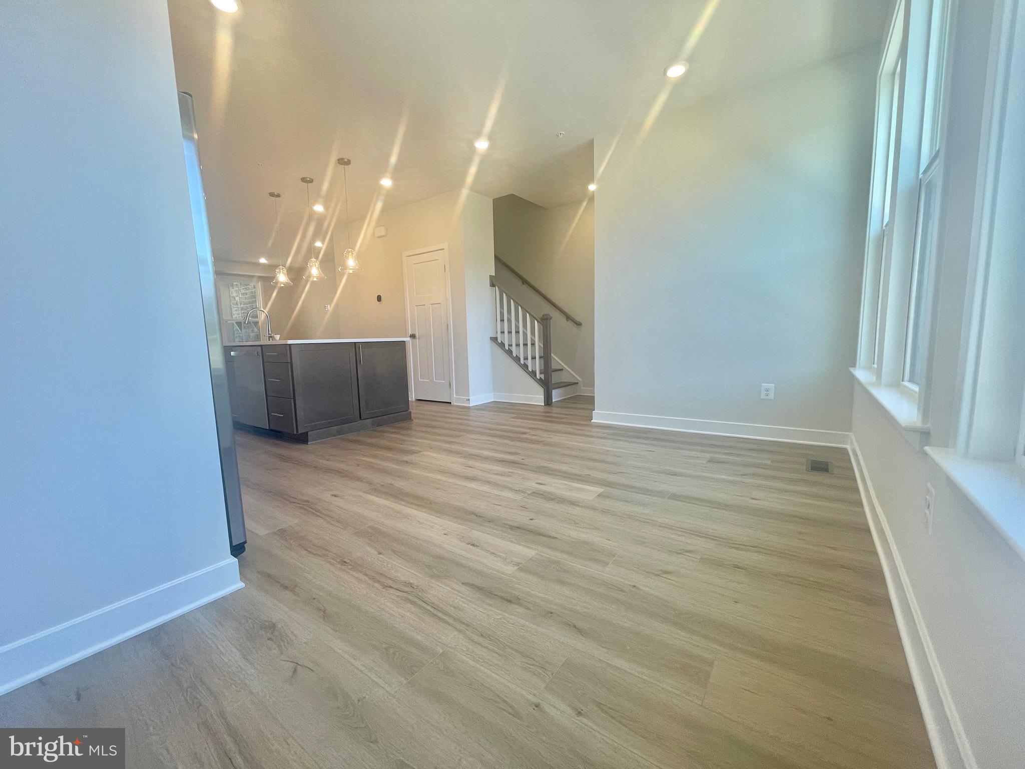 3563 Worthington Boulevard Frederick, MD 21704 - Photo 17 of 52 a view of a hallway with wooden floor