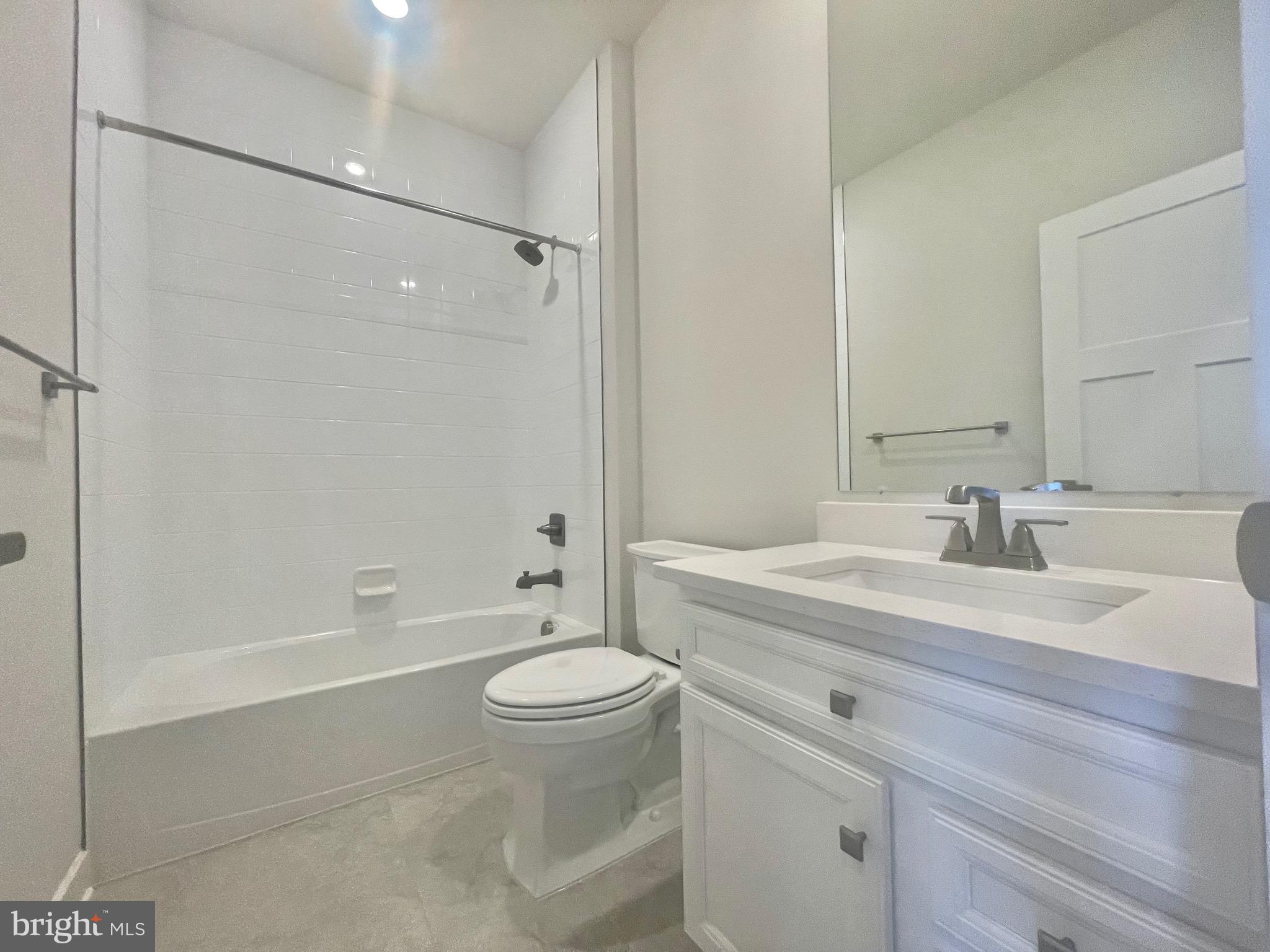 3563 Worthington Boulevard Frederick, MD 21704 - Photo 18 of 52 a bathroom with a sink a toilet and shower