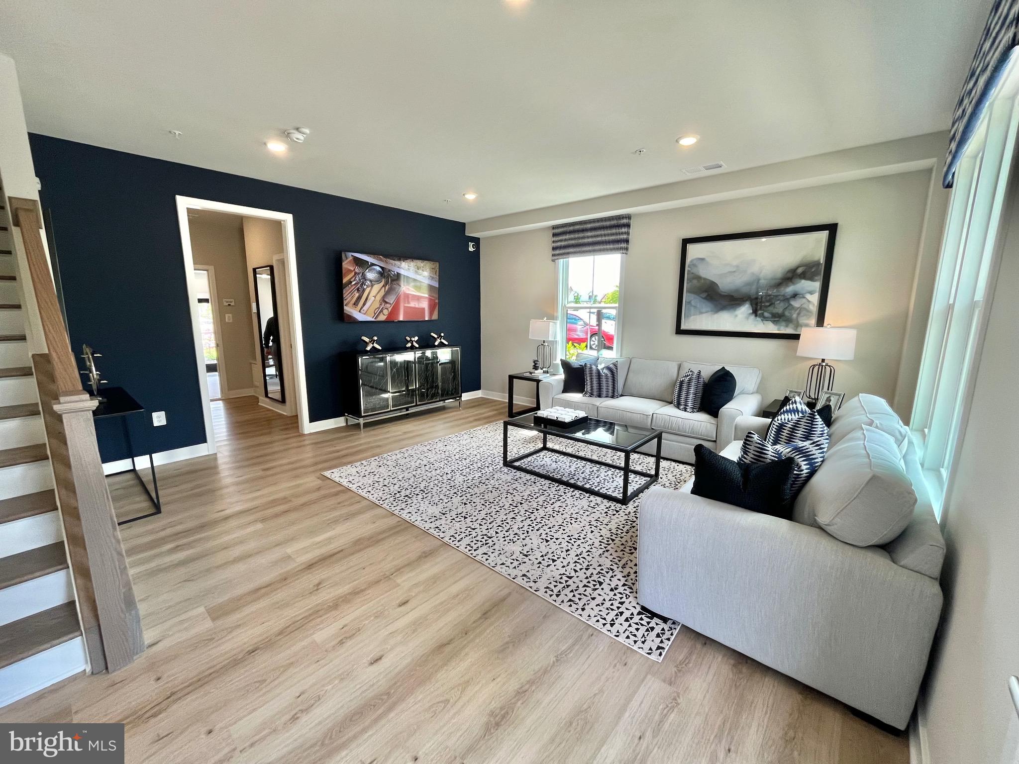 3563 Worthington Boulevard Frederick, MD 21704 - Photo 31 of 52 a living room with furniture and a flat screen tv