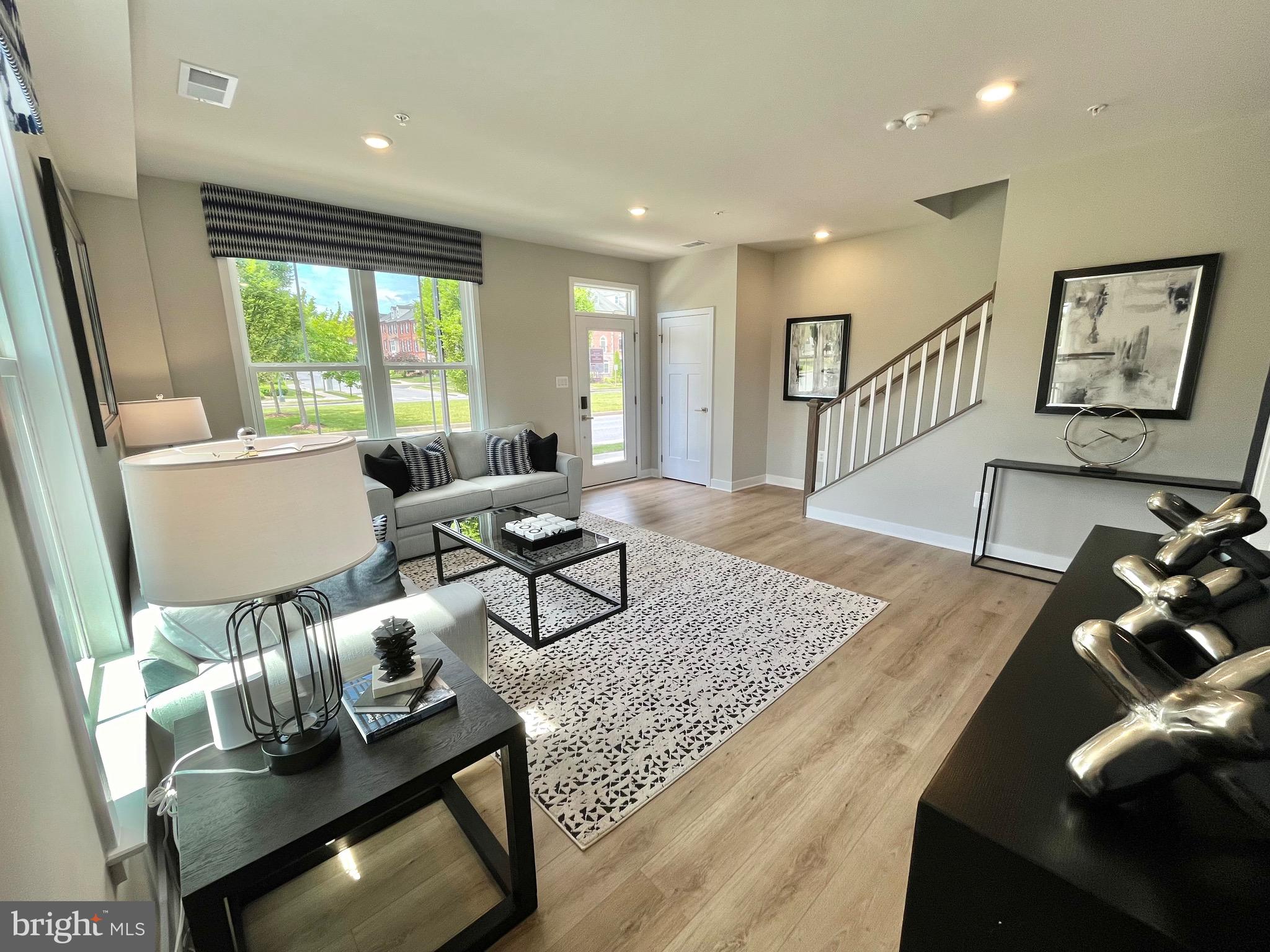 3563 Worthington Boulevard Frederick, MD 21704 - Photo 32 of 52 a living room with furniture and a wooden floor