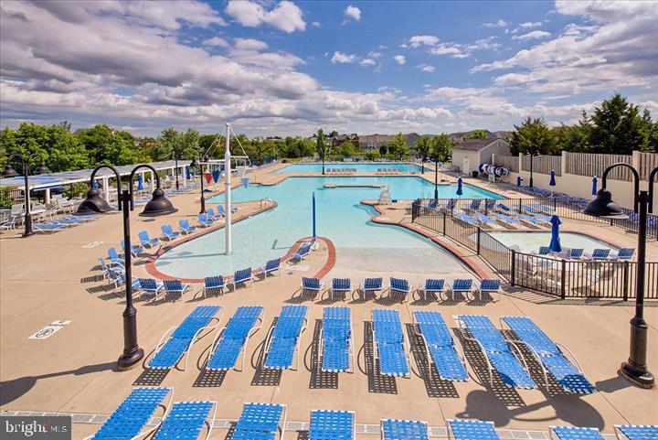 3563 Worthington Boulevard Frederick, MD 21704 - Photo 38 of 52 a view of a swimming pool with an outdoor seating