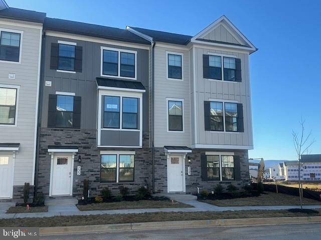 725 Compass Way Frederick, MD 21701 - Photo 2 of 47 a front view of a multi story building