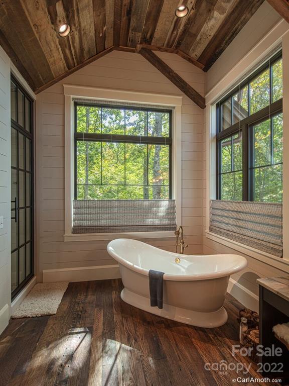 61 Back Bone Way, Unit 203 Sylva, NC 28779 - Photo 24 of 48 a living room with furniture and a window