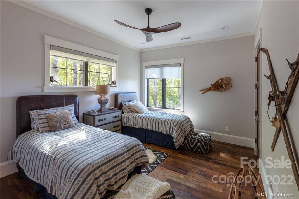 61 Back Bone Way, Unit 203 Sylva, NC 28779 - Photo 34 of 48 a bedroom with two beds and a window