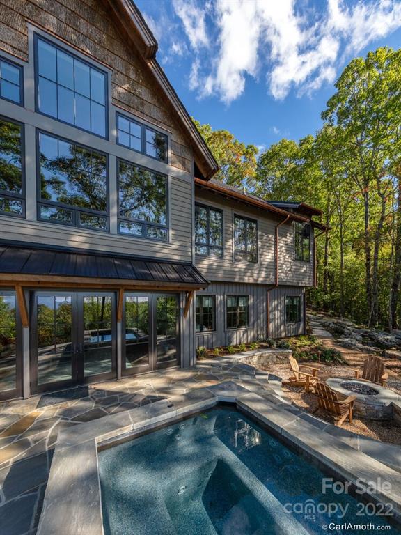 61 Back Bone Way, Unit 203 Sylva, NC 28779 - Photo 41 of 48 a front view of a house with garden