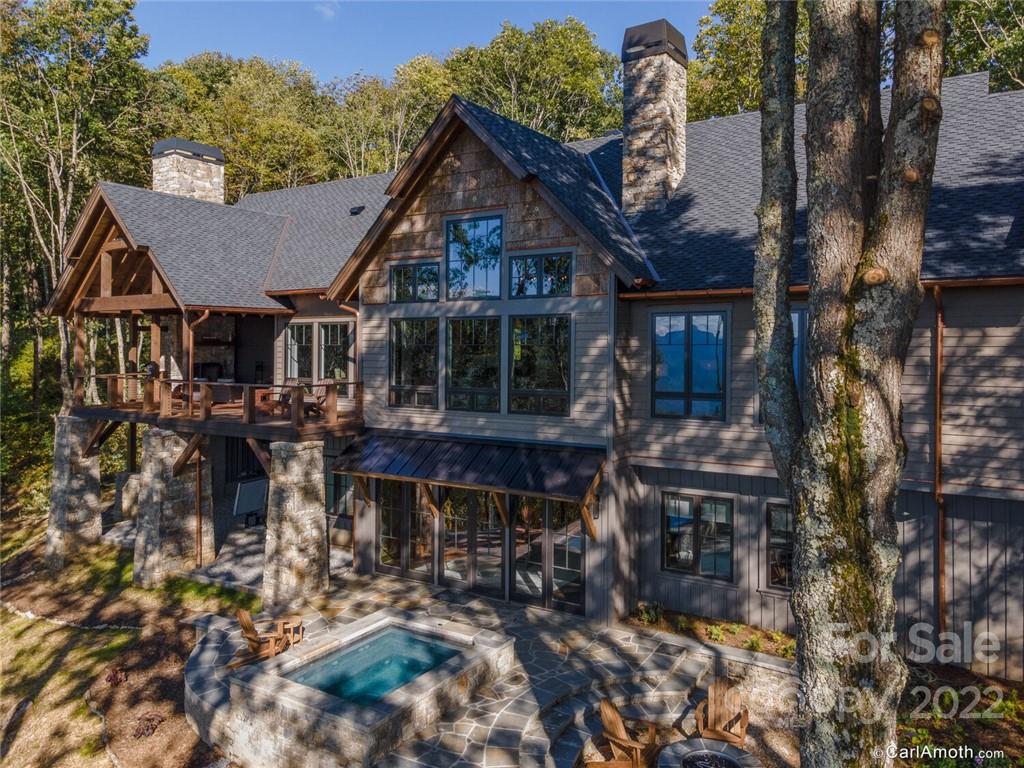 61 Back Bone Way, Unit 203 Sylva, NC 28779 - Photo 42 of 48 a front view of a house with a yard