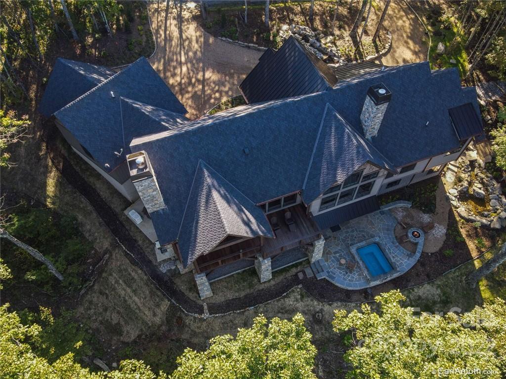 61 Back Bone Way, Unit 203 Sylva, NC 28779 - Photo 44 of 48 front view of a house with a yard