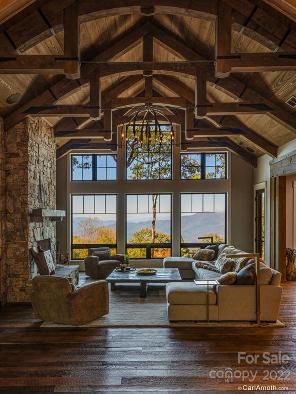 61 Back Bone Way, Unit 203 Sylva, NC 28779 - Photo 7 of 48 a living room with furniture and large windows