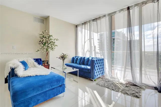 a kitchen with a dining table and chairs