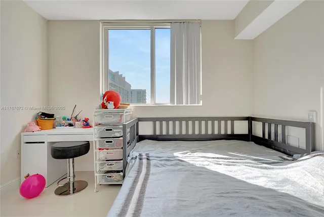 a view of a patio with couches table and chairs with potted plants and big yard