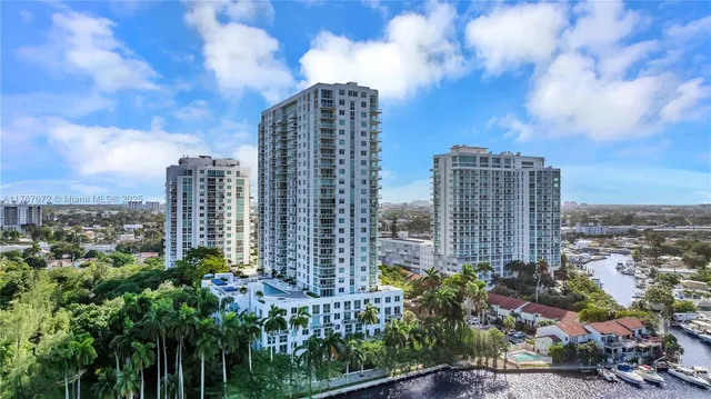 a view of a backyard with sitting area
