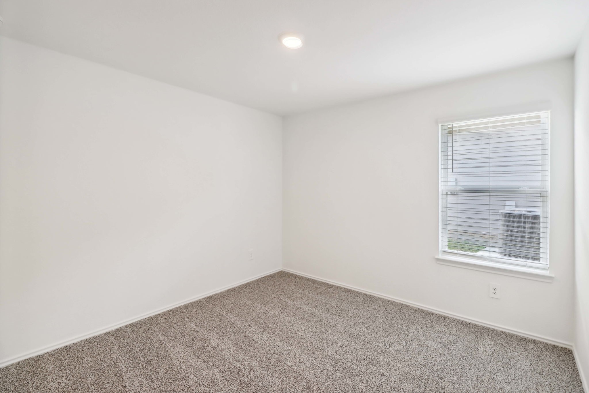 541 Wax Myrtle Way Hockley, TX 77447 - Photo 8 of 15 an empty room with a window