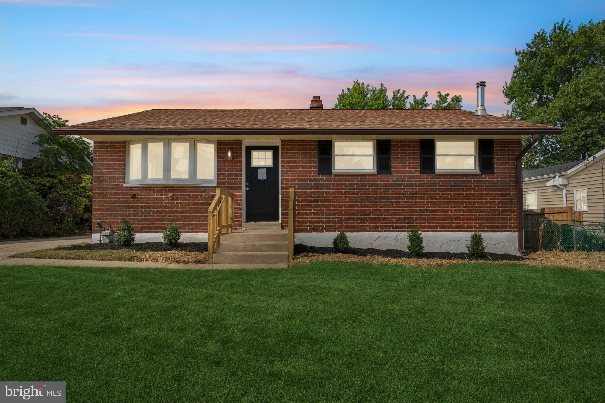 4436 Ebenezer Road Nottingham, MD 21236 - Photo 1 of 51 a front view of a house with a garden and plants
