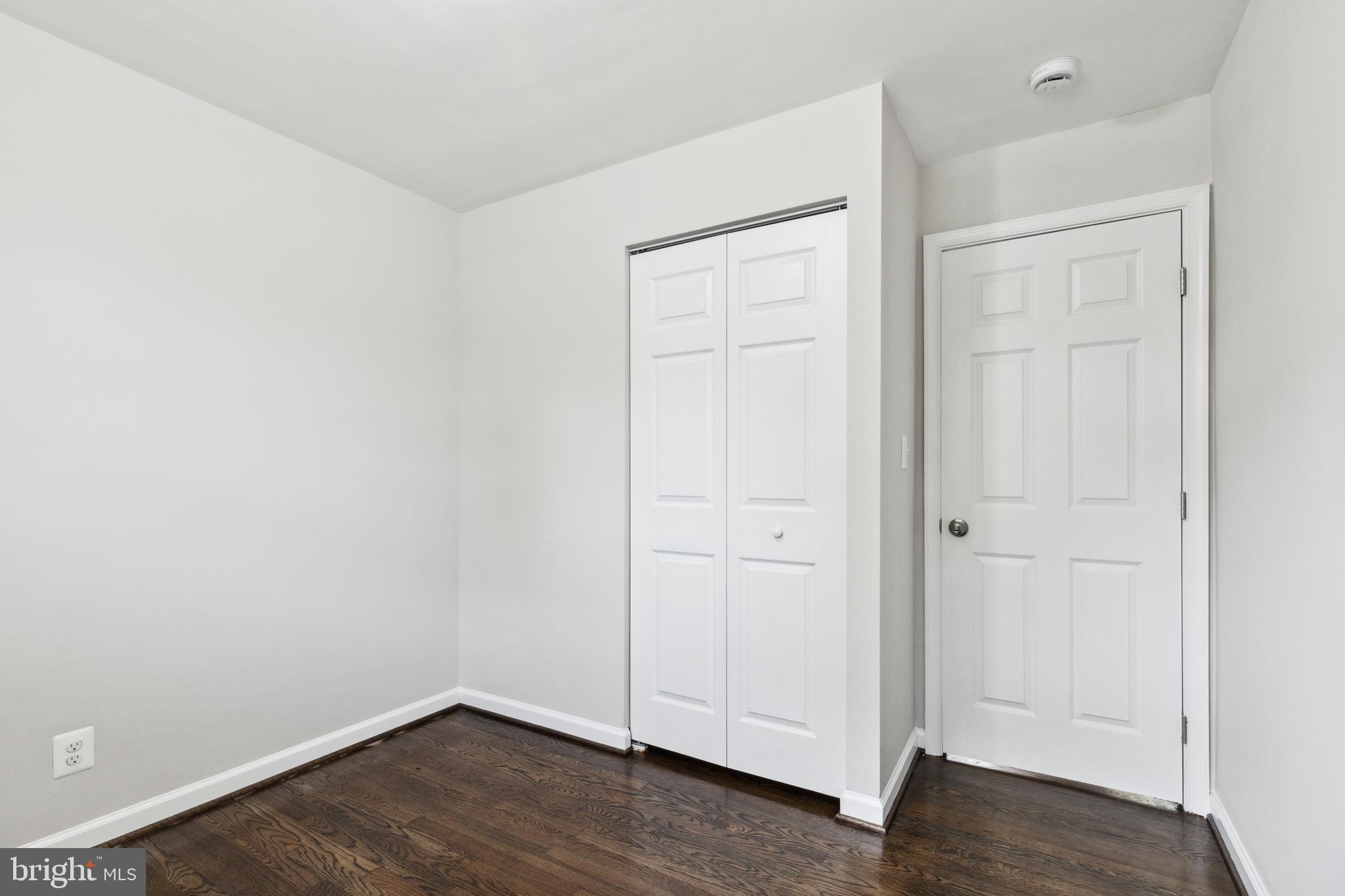 4436 Ebenezer Road Nottingham, MD 21236 - Photo 29 of 51 an empty room with wooden floor