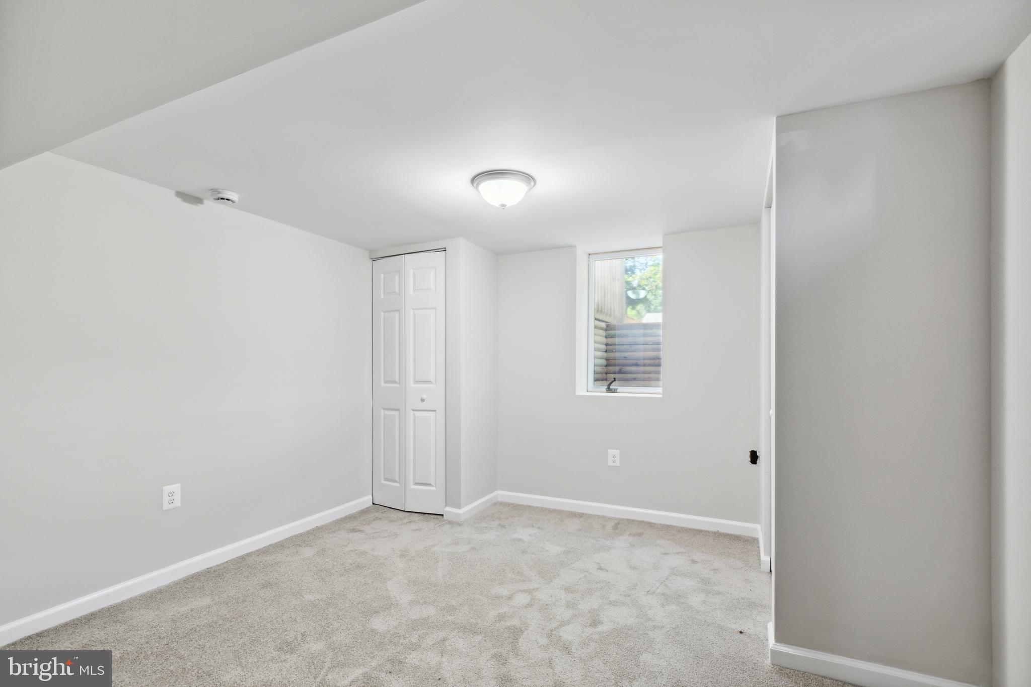 4436 Ebenezer Road Nottingham, MD 21236 - Photo 33 of 51 an empty room with windows