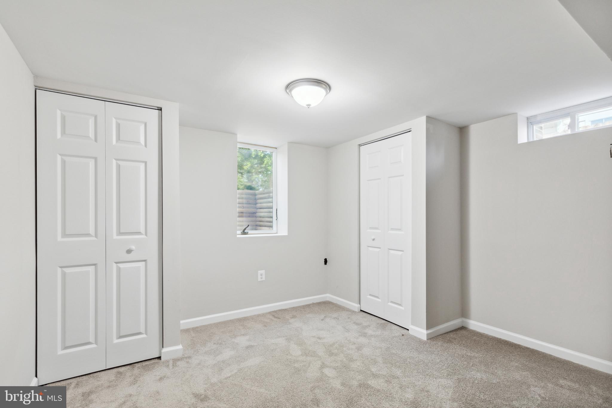 4436 Ebenezer Road Nottingham, MD 21236 - Photo 34 of 51 an empty room with windows and closet