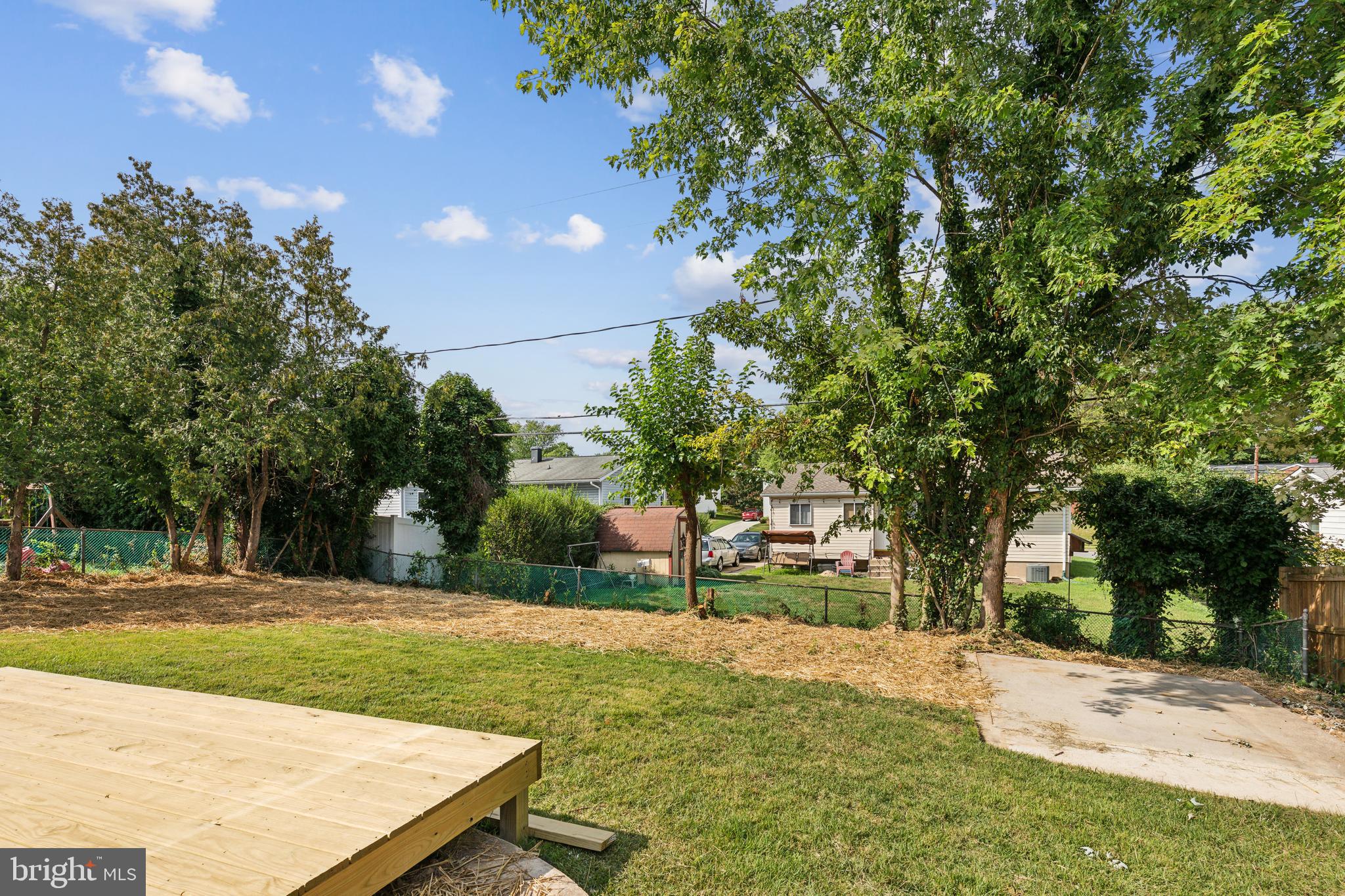 4436 Ebenezer Road Nottingham, MD 21236 - Photo 47 of 51 a view of a yard with plants and trees