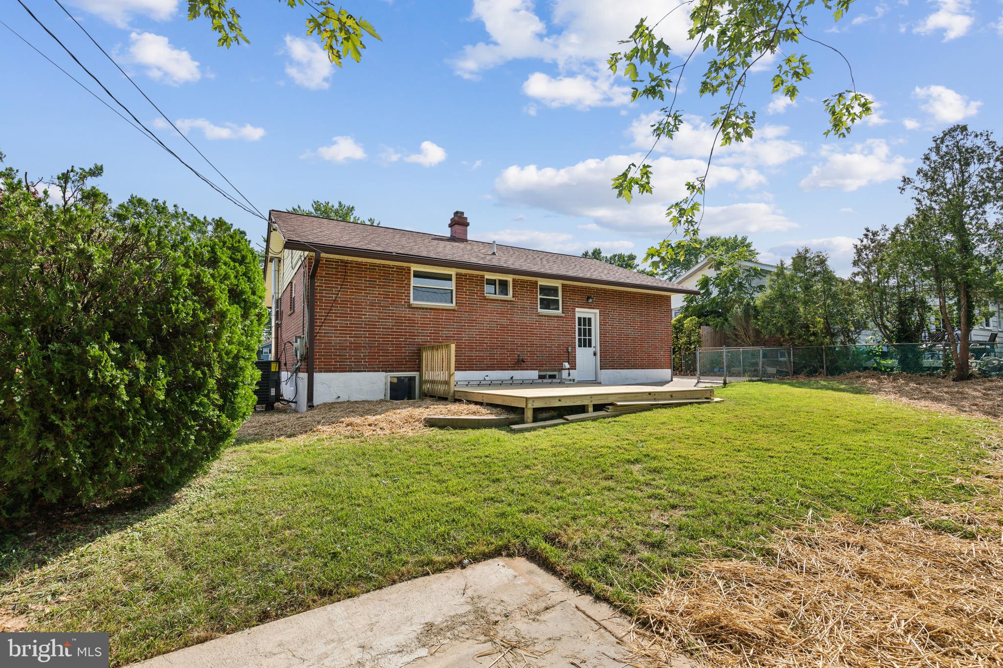 4436 Ebenezer Road Nottingham, MD 21236 - Photo 48 of 51 a view of a backyard with table and chairs and potted plants