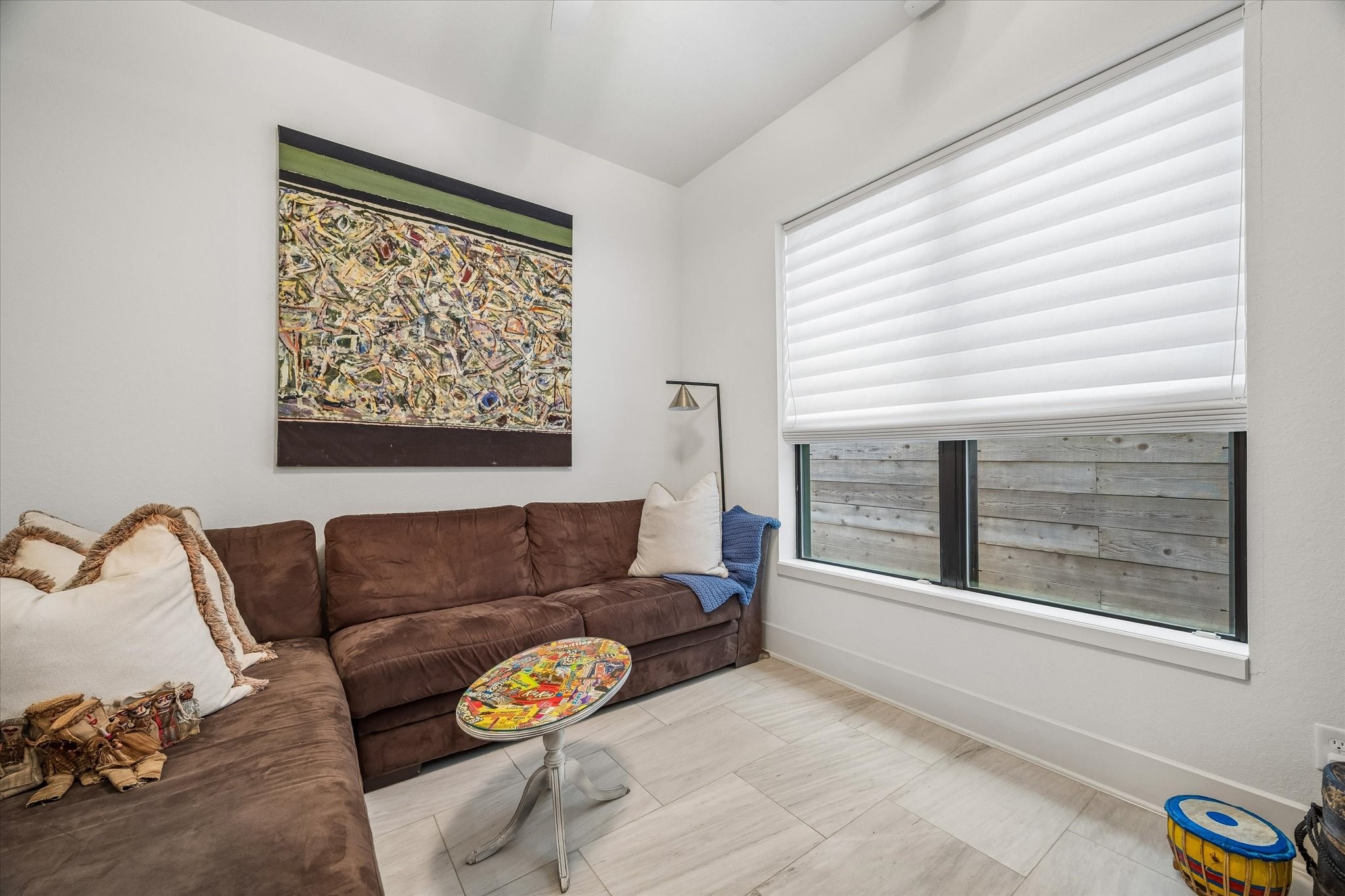 1526 Vermont Street Houston, TX 77006 - Photo 6 of 39 First-floor office or flex space with large window, high ceiling, and versatile space for relaxing or working from home.