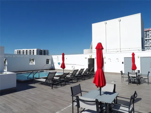 a view of a terrace with seating area