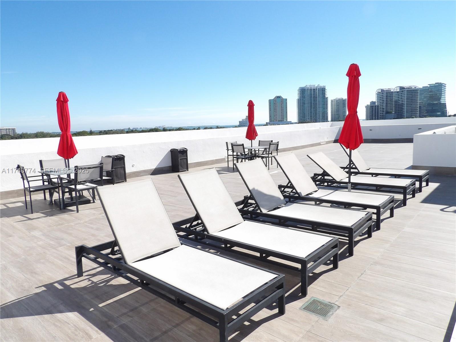 2740 Southwest 28th Terrace, Unit 301 Miami, FL 33133 - Photo 25 of 31 a view of a terrace with seating area