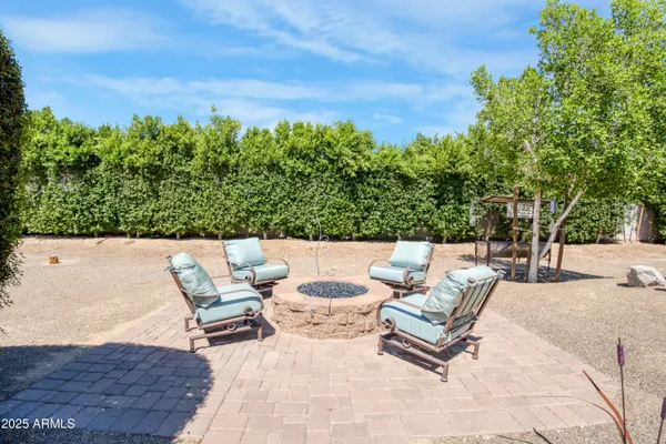 a outdoor living space with furniture and city view