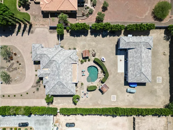 an aerial view of houses with outdoor space