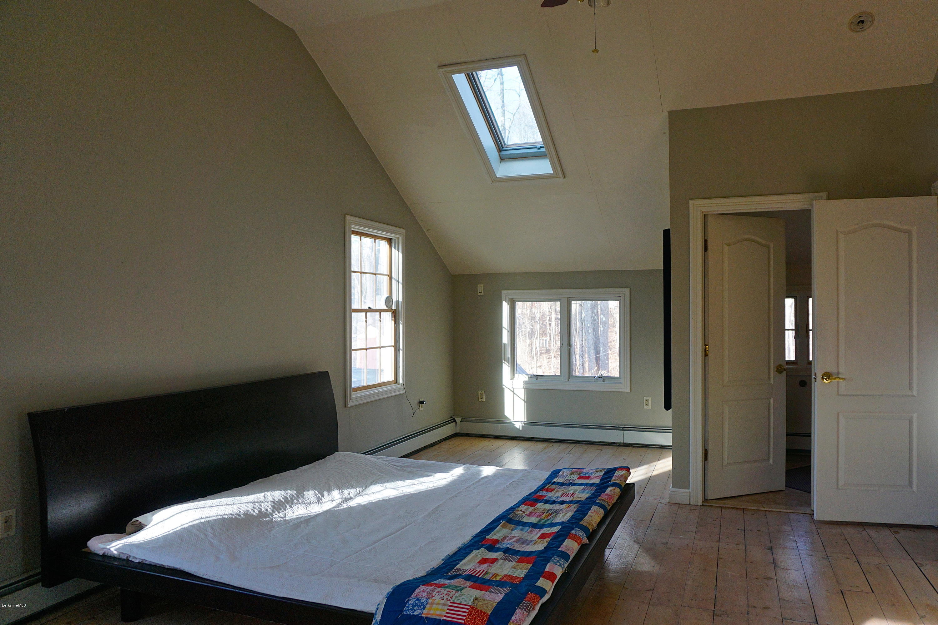 405 Main Road Monterey, MA 01245 - Photo 12 of 26 a bedroom with bed and window