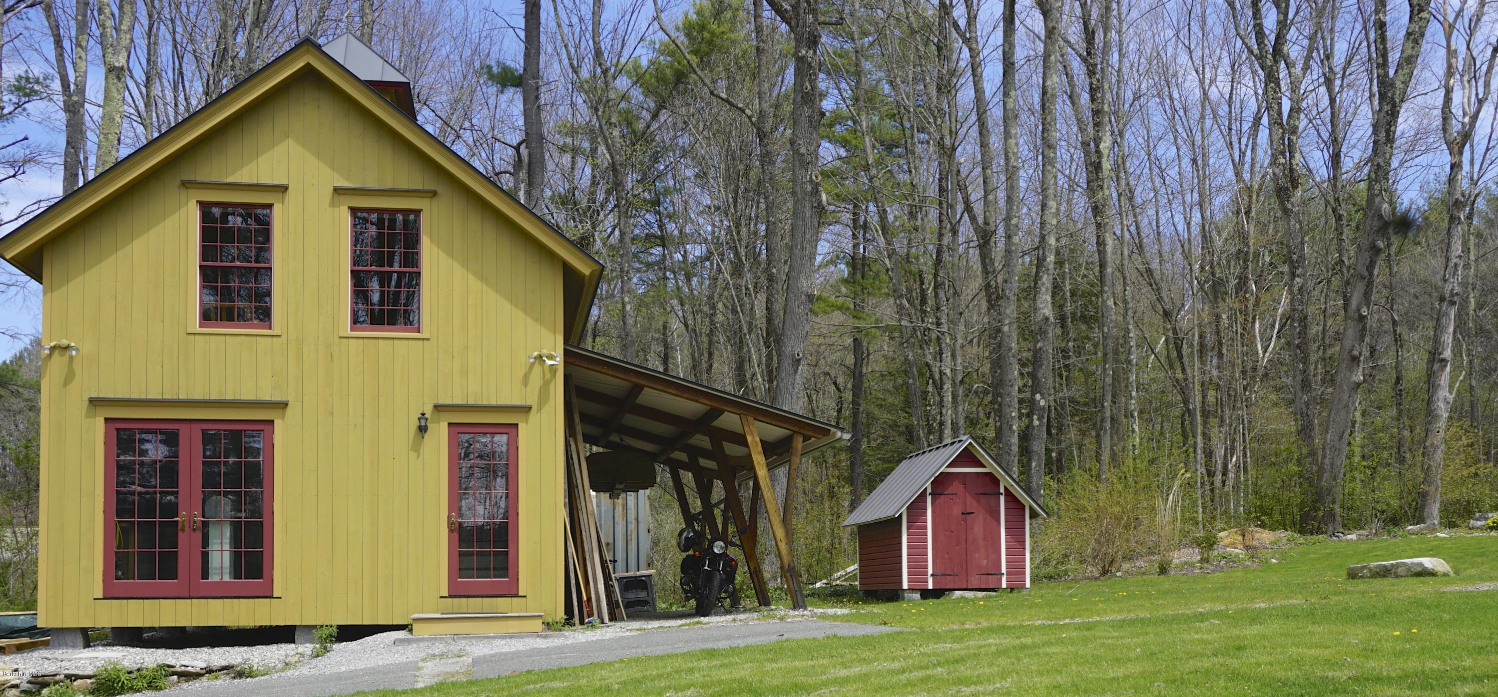 405 Main Road Monterey, MA 01245 - Photo 15 of 26 a view of a house with backyard
