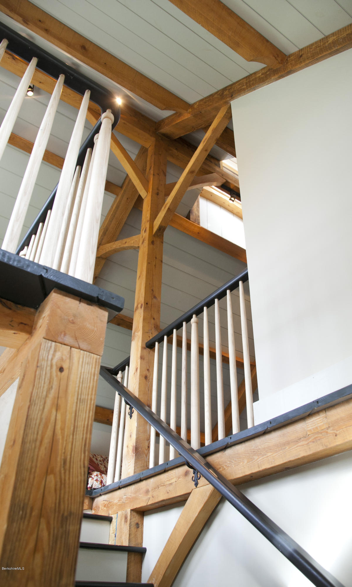 405 Main Road Monterey, MA 01245 - Photo 17 of 26 a view of staircase with wooden floor