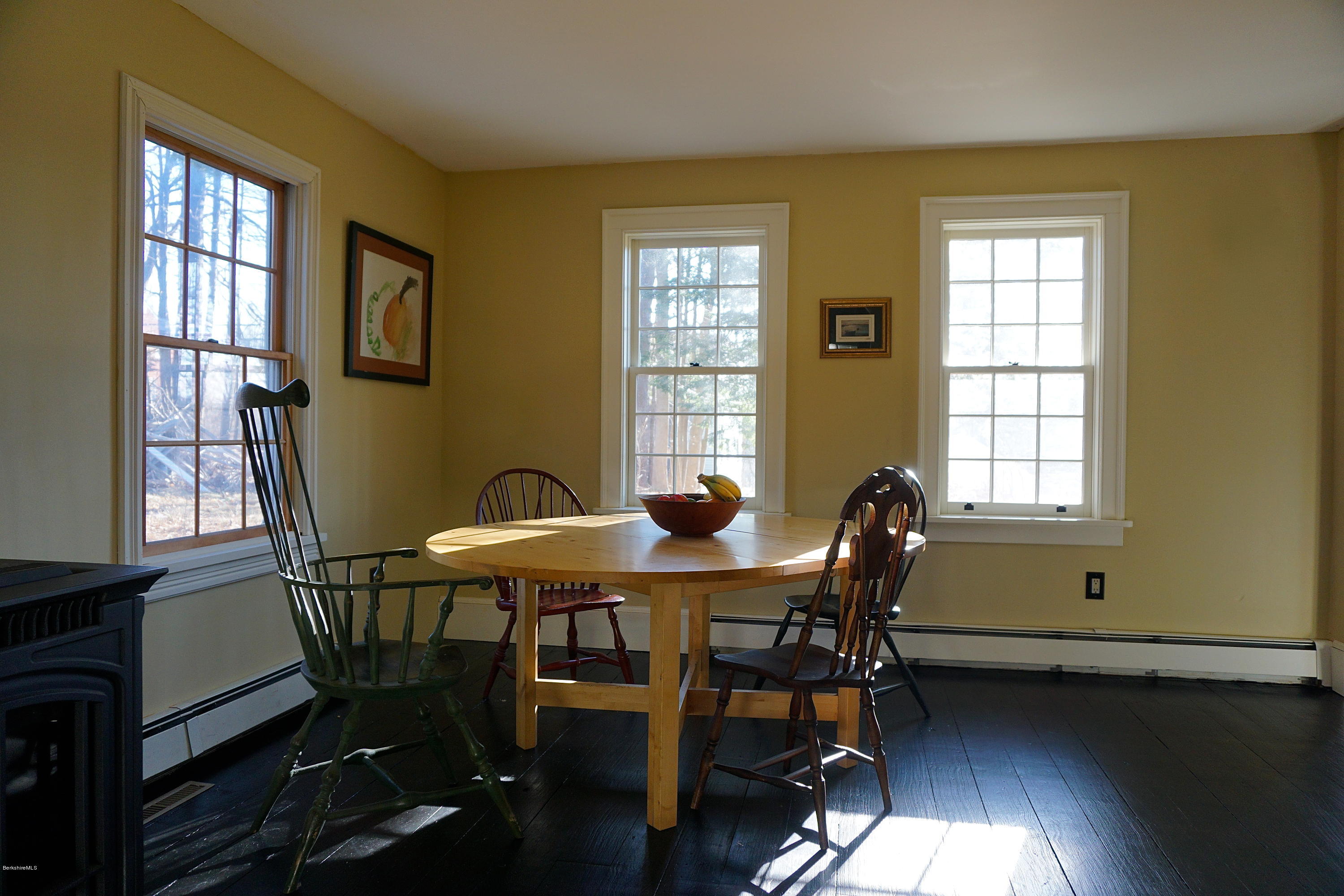 405 Main Road Monterey, MA 01245 - Photo 4 of 26 a view of a dining room with furniture and window