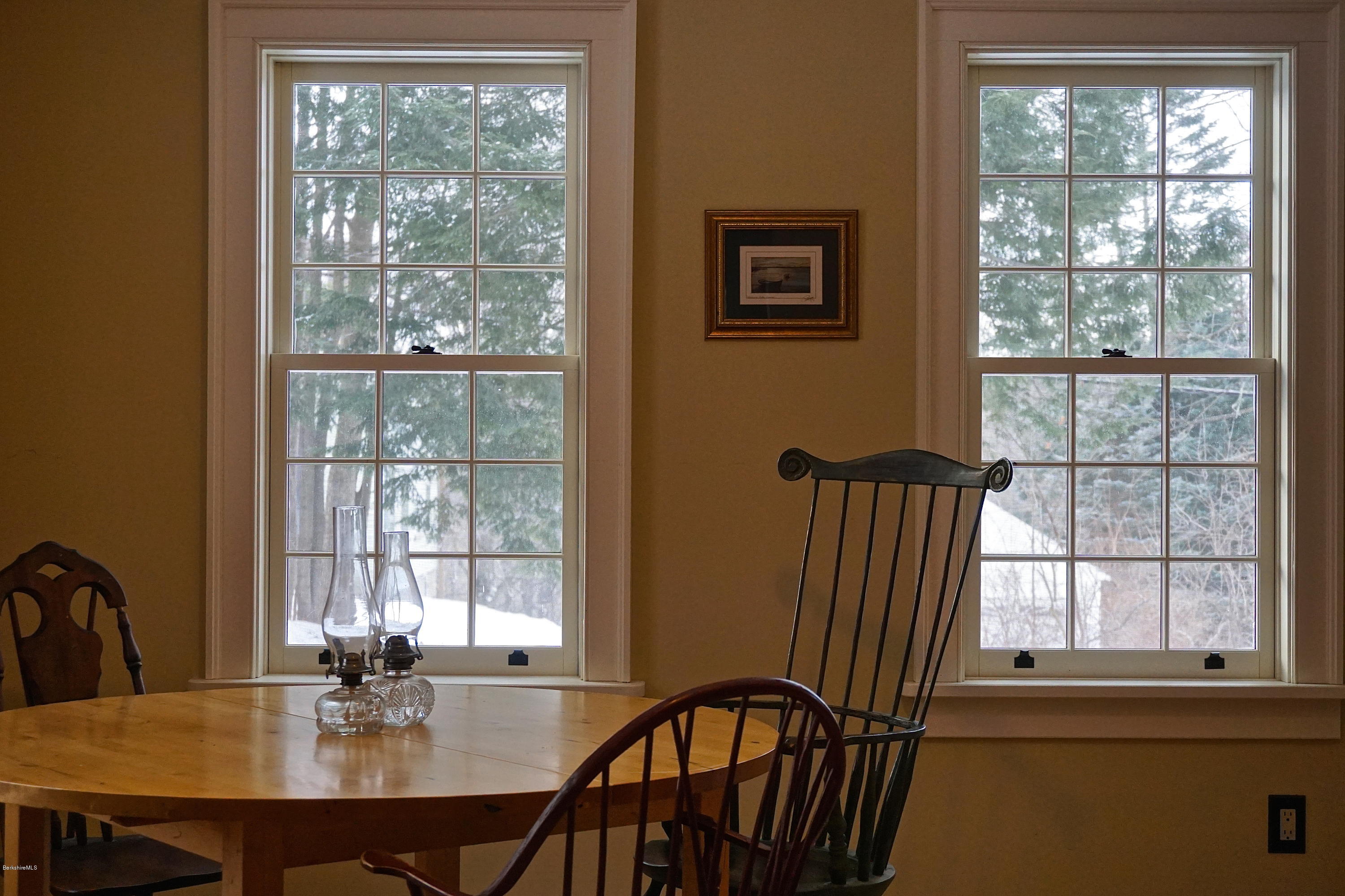 405 Main Road Monterey, MA 01245 - Photo 5 of 26 a view of a dining room with furniture window and outside view