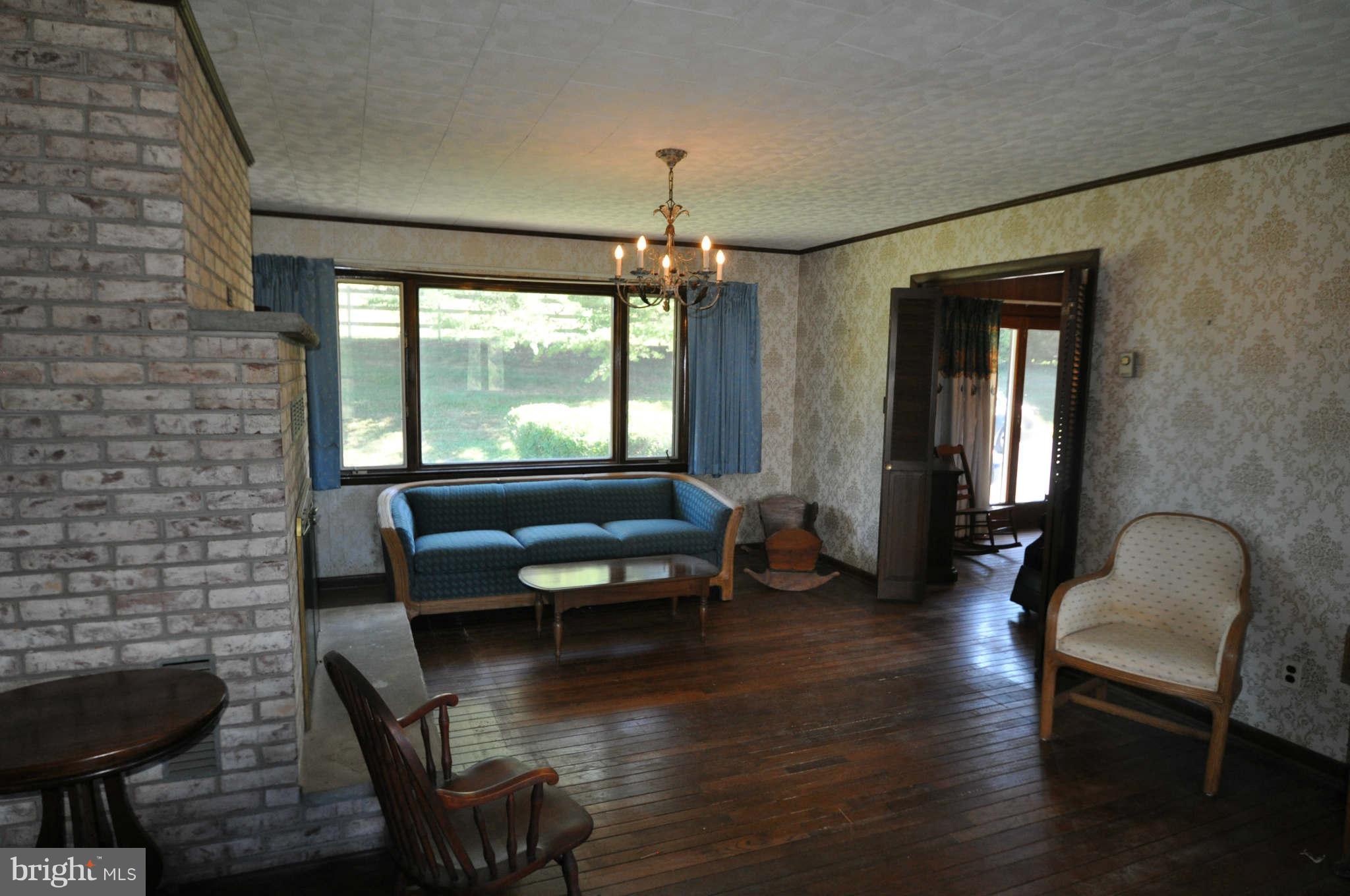 1454 Pleasant Valley Road Westminster, MD 21158 - Photo 16 of 27 SPACIOUS LIVING ROOM WITH COZY FIREPLACE