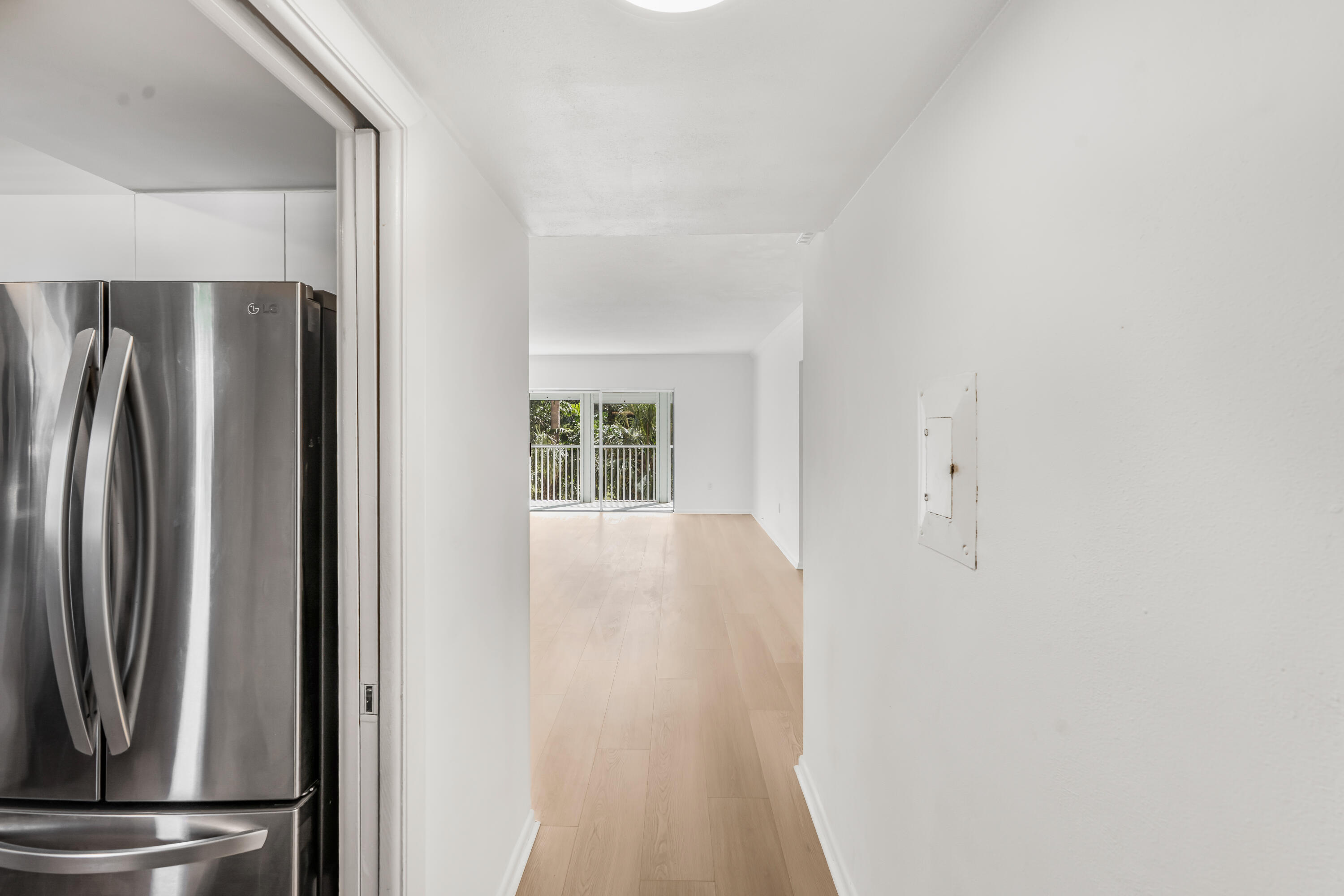 200 East Royal Palm Road, Unit 2030 Boca Raton, FL 33432 - Photo 4 of 20 a view of a kitchen with refrigerator and windows