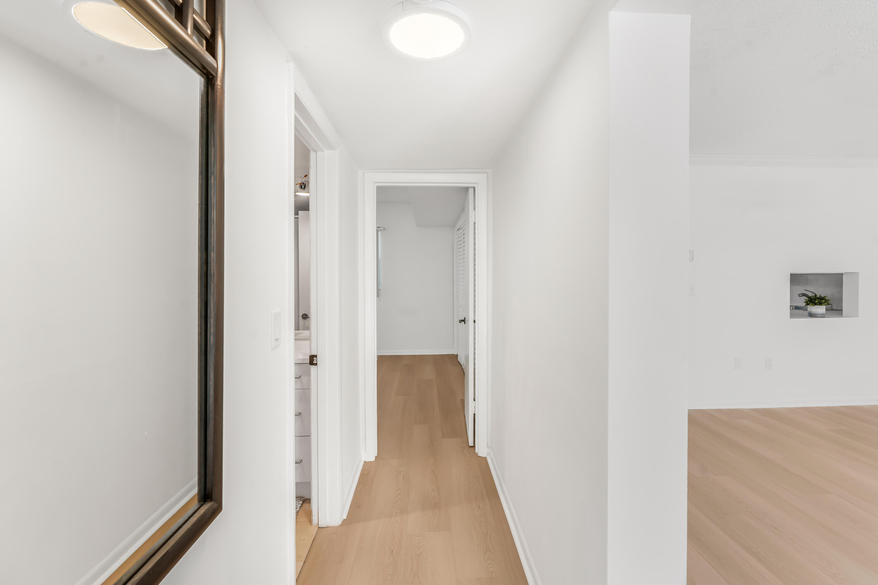 200 East Royal Palm Road, Unit 2030 Boca Raton, FL 33432 - Photo 7 of 20 a view of a hallway with wooden floor
