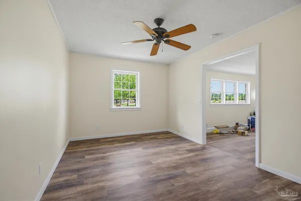 a view of an empty room and window