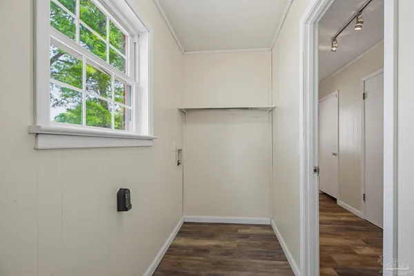 a view of a bathroom from the hallway