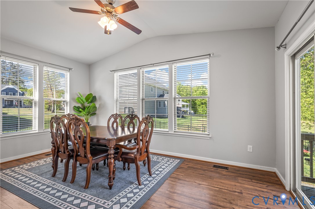 8200 Timberstone Drive Chesterfield, VA 23832 - Photo 18 of 42 a view of a dining room with furniture window and wooden floor