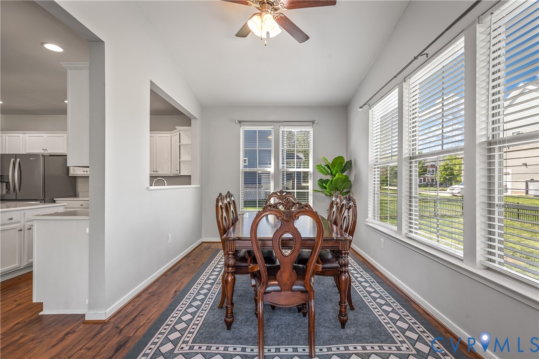 8200 Timberstone Drive Chesterfield, VA 23832 - Photo 19 of 42 a view of a dining room with furniture window and wooden floor