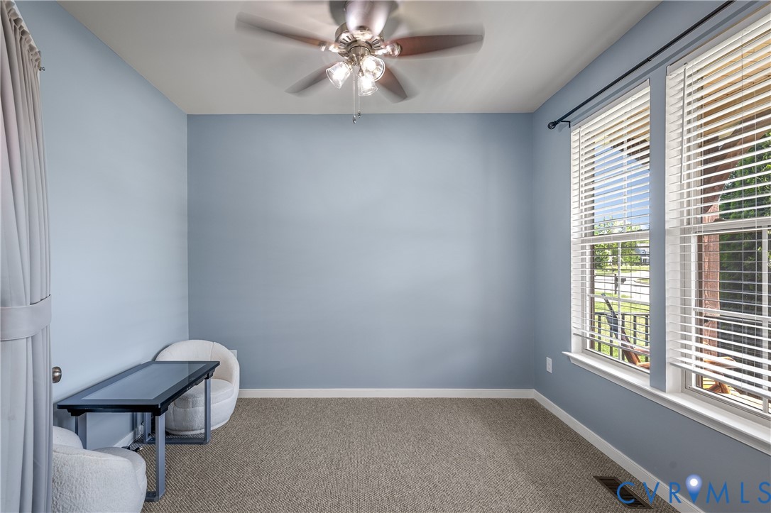 8200 Timberstone Drive Chesterfield, VA 23832 - Photo 20 of 42 an empty room with windows and fan