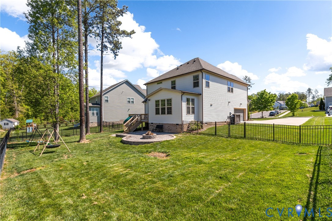 8200 Timberstone Drive Chesterfield, VA 23832 - Photo 2 of 42 a view of a house with backyard and sitting area