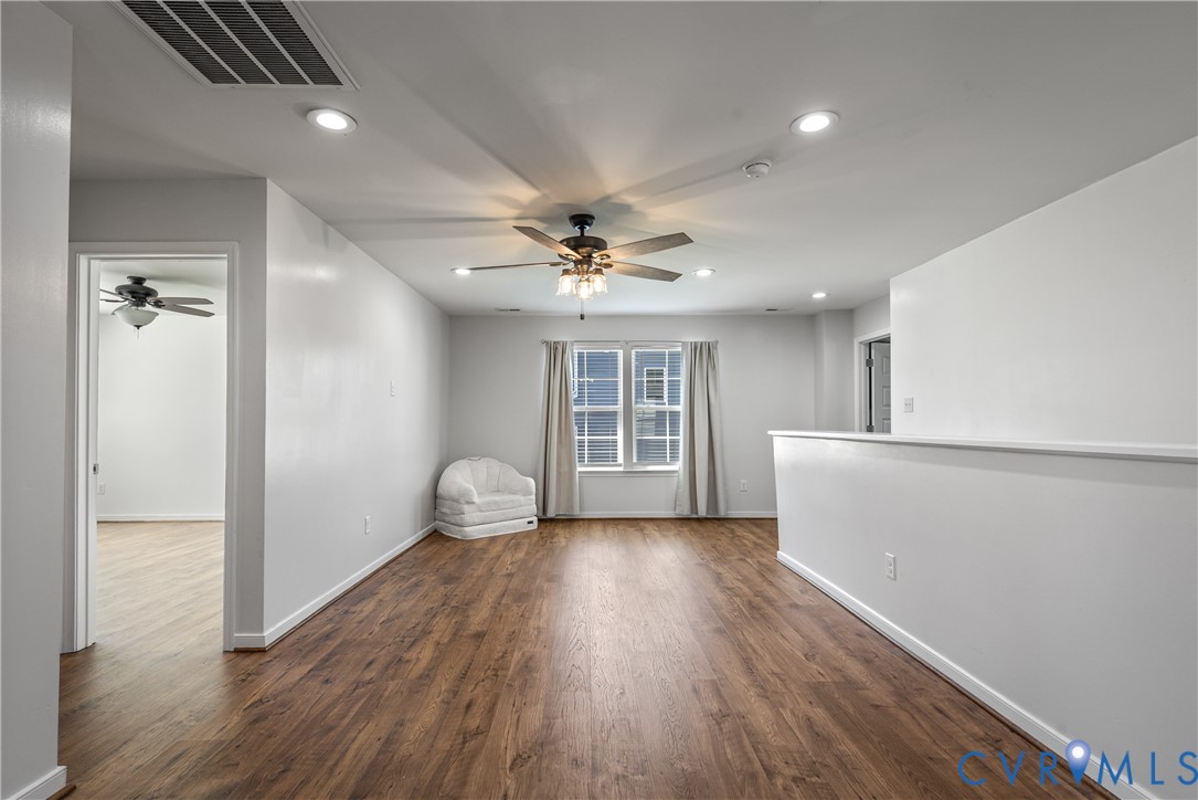 8200 Timberstone Drive Chesterfield, VA 23832 - Photo 26 of 42 wooden floor in an empty room with a window