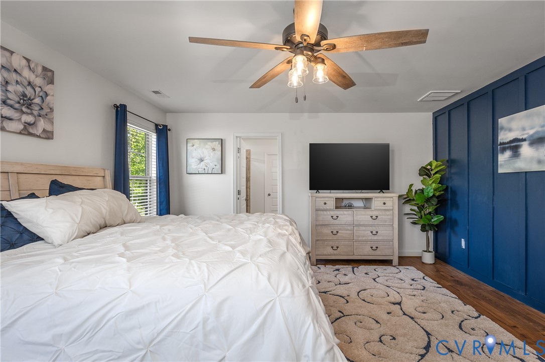 8200 Timberstone Drive Chesterfield, VA 23832 - Photo 29 of 42 a bedroom with a bed and a flat screen tv