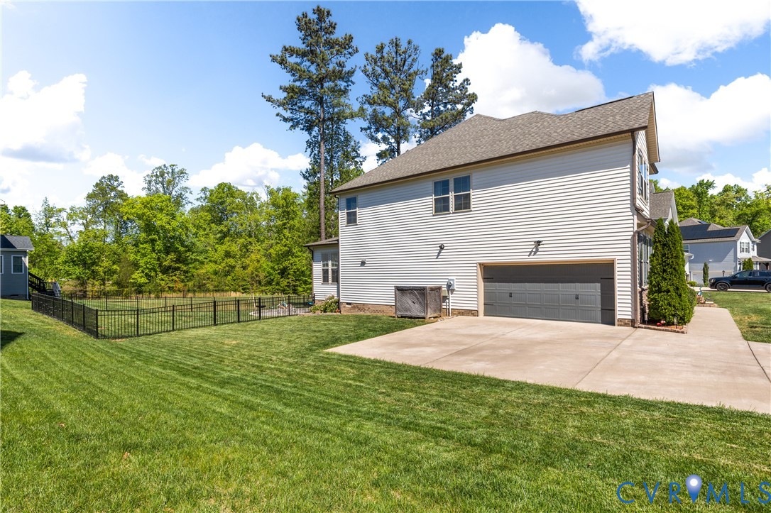 8200 Timberstone Drive Chesterfield, VA 23832 - Photo 3 of 42 a view of a house with a yard and potted plants