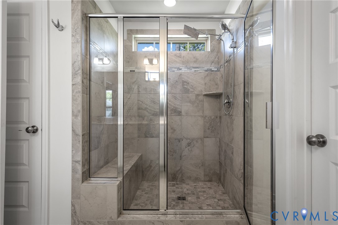 8200 Timberstone Drive Chesterfield, VA 23832 - Photo 31 of 42 a bathroom with a glass shower door