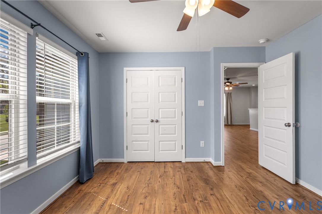 8200 Timberstone Drive Chesterfield, VA 23832 - Photo 33 of 42 wooden floor in an empty room with a window